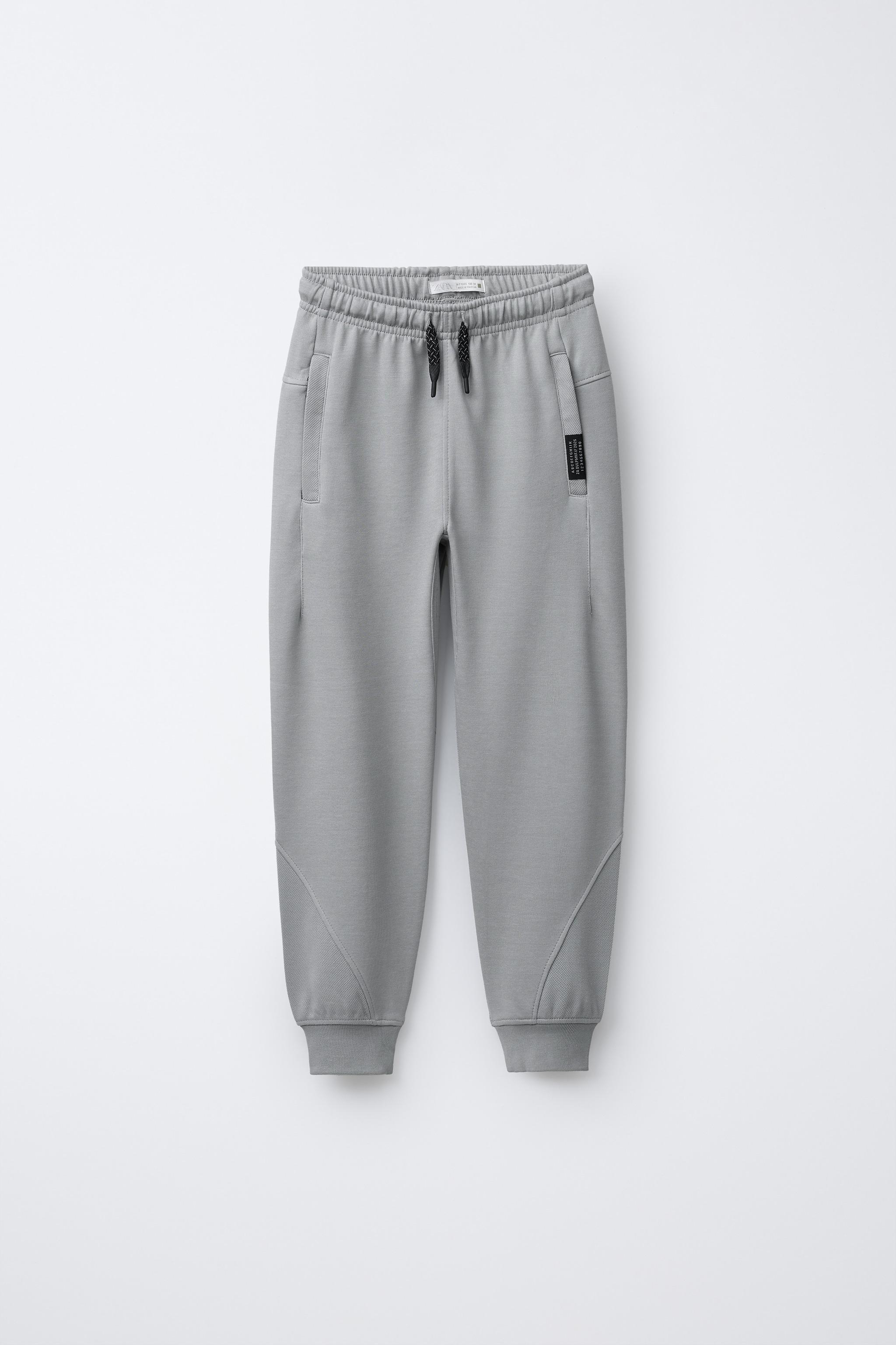 PANTALON EN MOLLETON INTERLOCK ET PIQUÉ